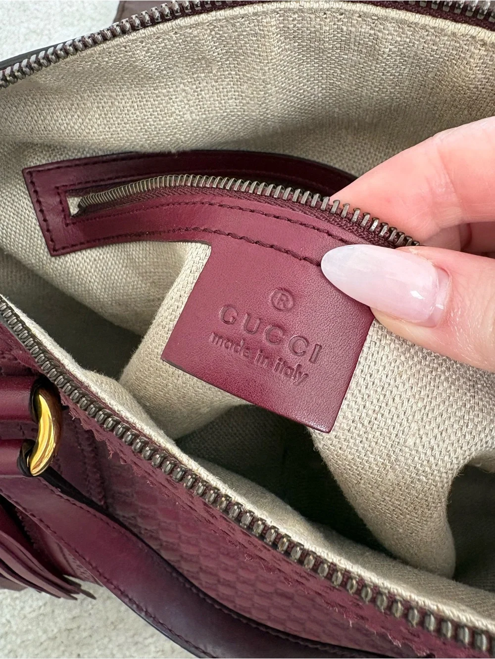 Gucci Burgundy Leather Tassel Satchel with Embossed Monogram